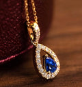 Elegante Tropfen Halskette mit blauem Kristall – Gold Damen Kette